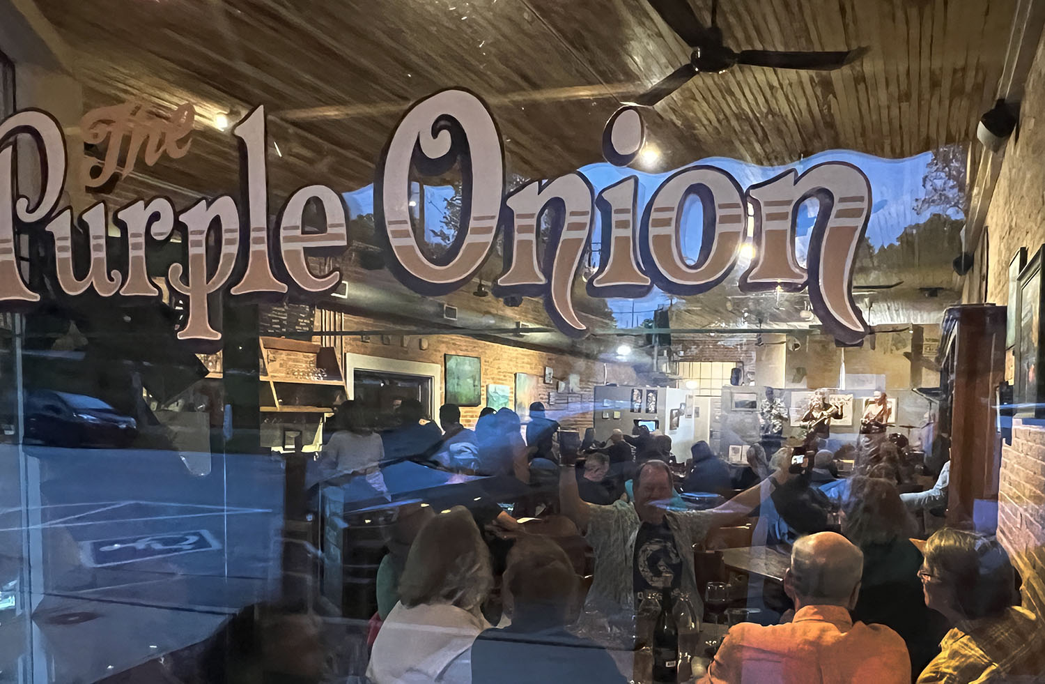 purple onion window with music-post